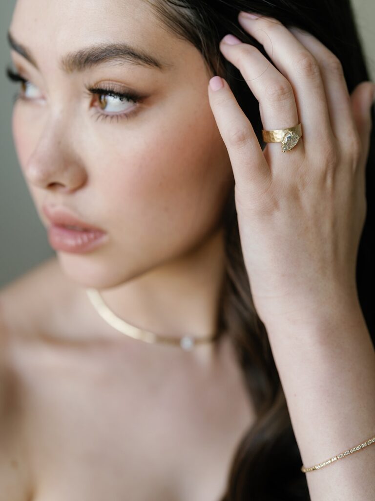 Closeup of Bride's engagement ring on wedding day