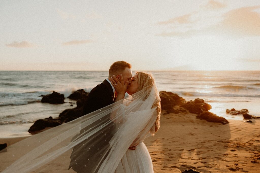 Bride & Groom enjoying sunset at Andaz Resort in Maui, Hi