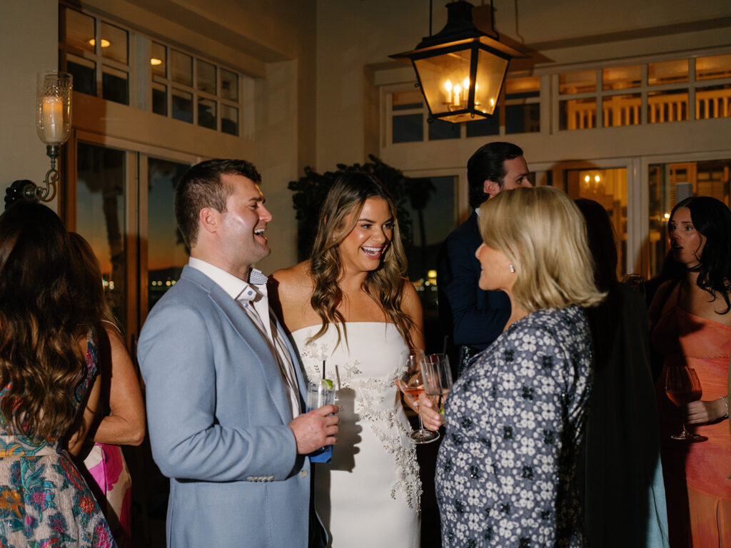 Couple chatting at rehearsal dinner